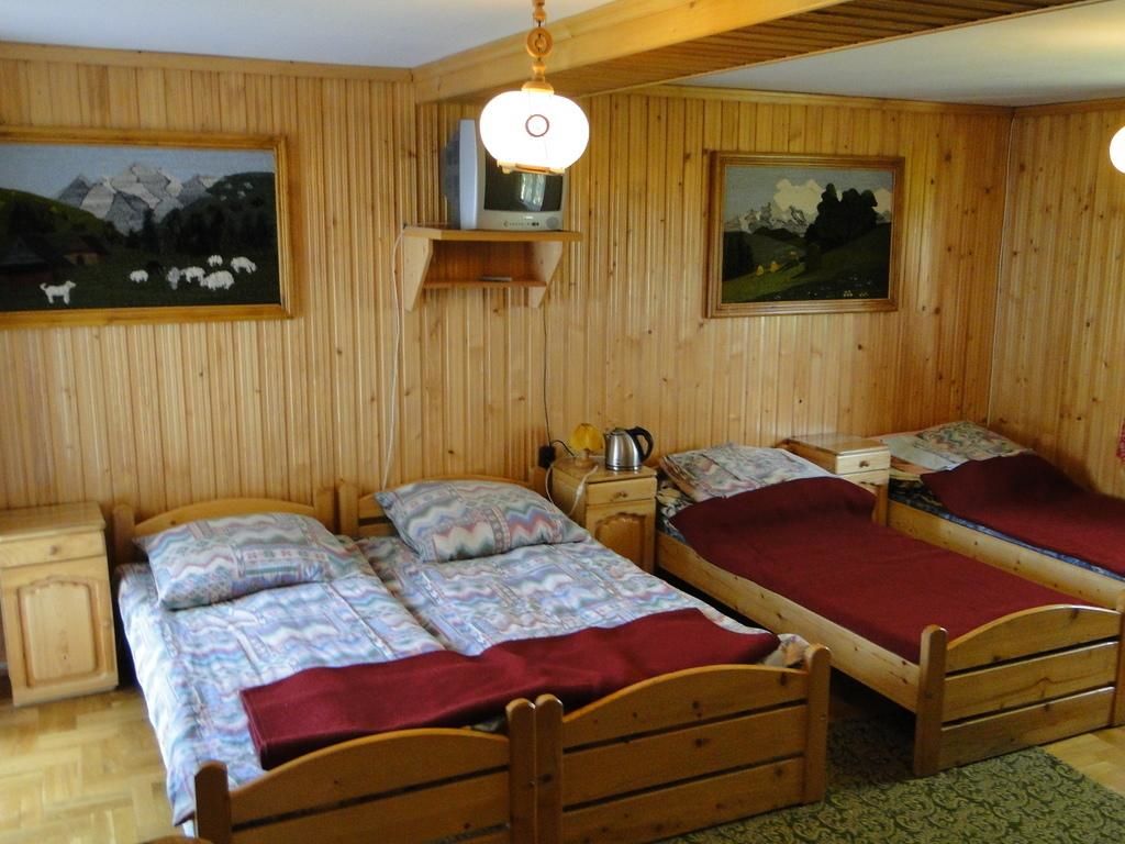 Отели типа «постель и завтрак» Pokoje u Tosi i Czesia Гличарув